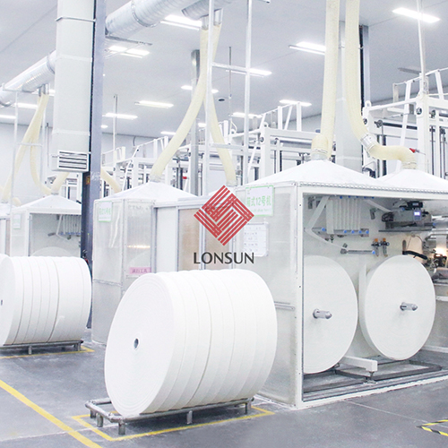 Absorbent core production line