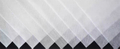Microscopic texture of diaper fabric fibers